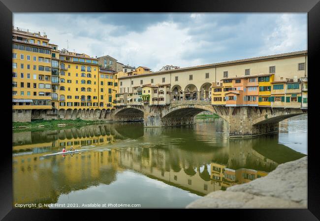 Rowing under the Ponte Vecchio  Framed Print by Nick Hirst