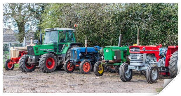 Collection of old tractors Print by Cliff Kinch