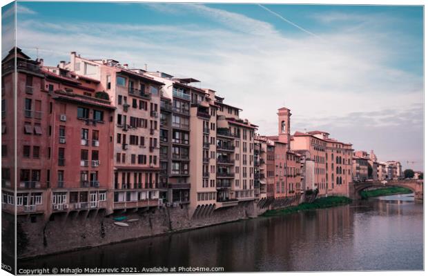 Beautiful Italian buildings over a river in Florence Canvas Print by Mihajlo Madzarevic