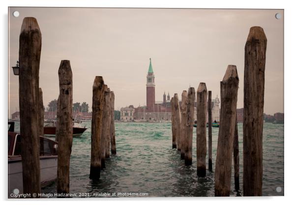 Wooden pillars at Venice bay symmetrically aligned pointing at Italian buildings in the back  Acrylic by Mihajlo Madzarevic
