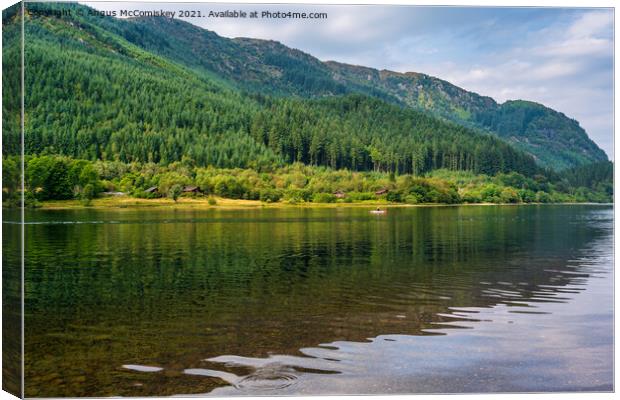 Paddle boarder on Loch Lubnaig Canvas Print by Angus McComiskey