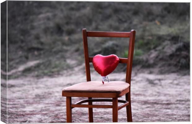 Red heart on the chair Canvas Print by Stan Lihai