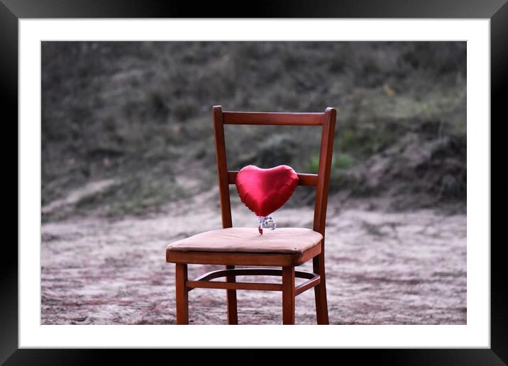 Red heart on the chair Framed Mounted Print by Stan Lihai