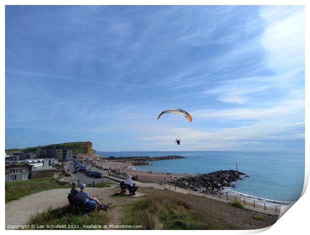 Paragliding over  west Bay Jurassic coast Print by Les Schofield
