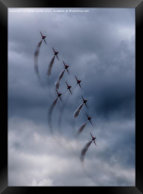 Thrilling Red Arrows Display over Bournemouth Framed Print by Derek Daniel
