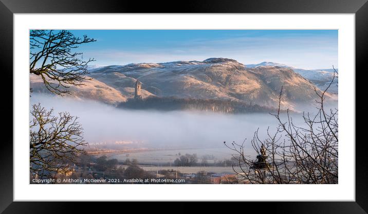 Wallace Monument and snow capped Ochil Hills  Framed Mounted Print by Anthony McGeever