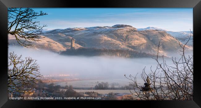 Wallace Monument and snow capped Ochil Hills  Framed Print by Anthony McGeever