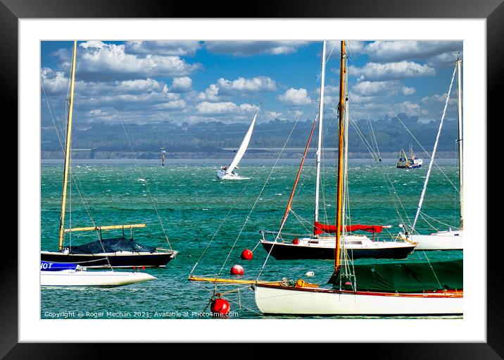 Sailing in the Solent on choppy water Framed Mounted Print by Roger Mechan