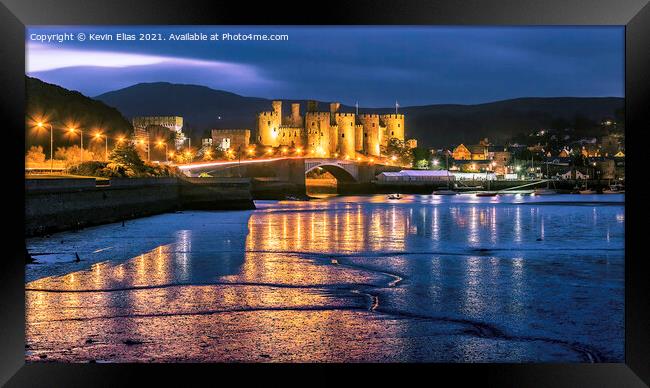 Twilight Brilliance Over Conwy Castle Framed Print by Kevin Elias