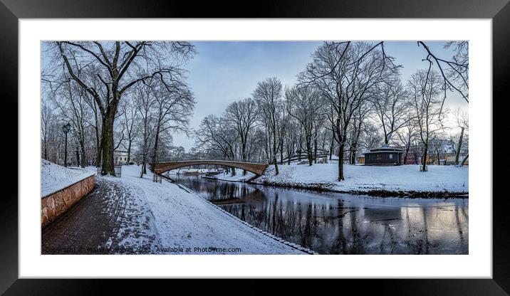 Winter park with stone bridge and canal Framed Mounted Print by Maria Vonotna