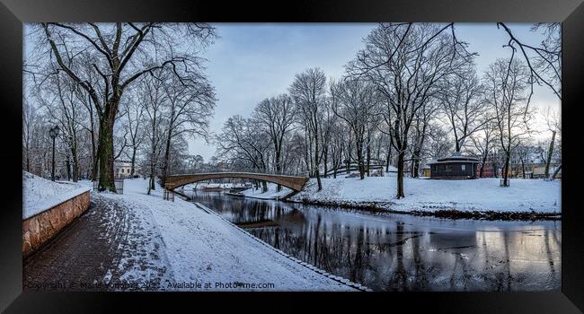 Winter park with stone bridge and canal Framed Print by Maria Vonotna