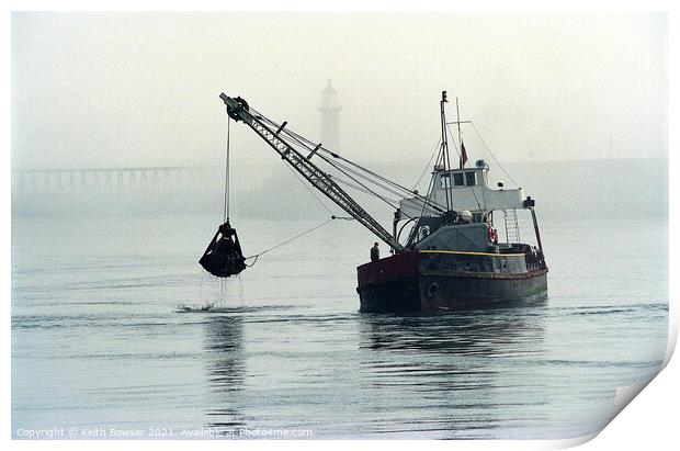 Dredger working in Whitby Harbour Print by Keith Bowser