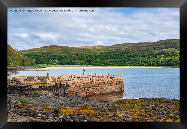 Old stone pier at Calgary Bay, Isle of Mull Framed Print by Angus McComiskey