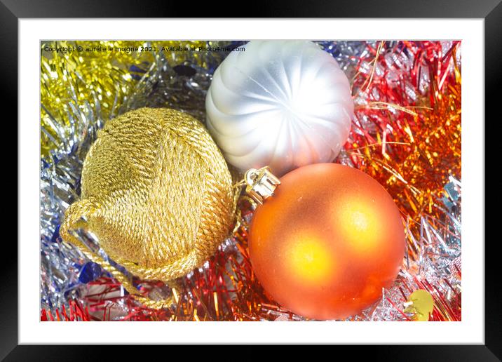 Christmas balls on tinsel Framed Mounted Print by aurélie le moigne