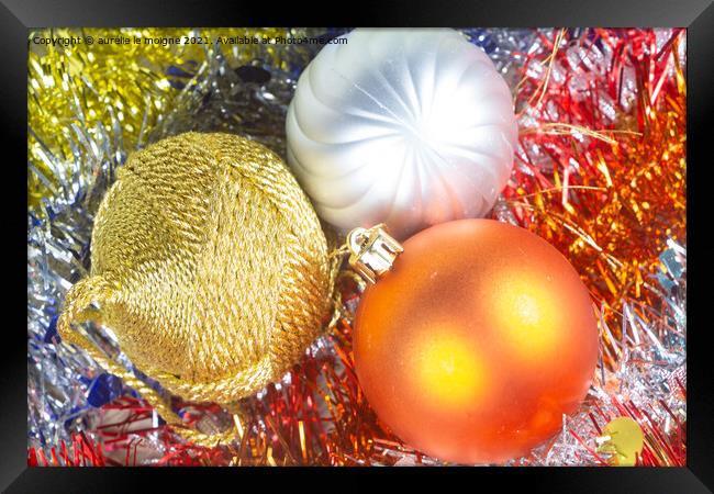 Christmas balls on tinsel Framed Print by aurélie le moigne