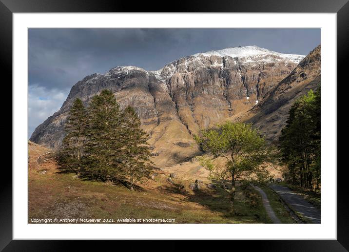 Snow capped scottish highlands Framed Mounted Print by Anthony McGeever