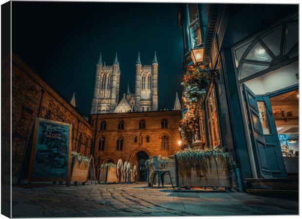 Lincoln Cathedral and the night glow  Canvas Print by Andrew Scott