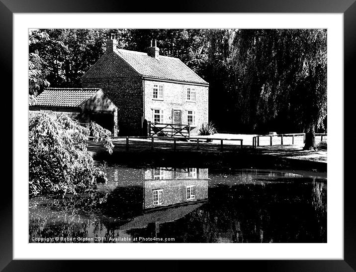The Village pond in reflective mood. Framed Mounted Print by Robert Gipson