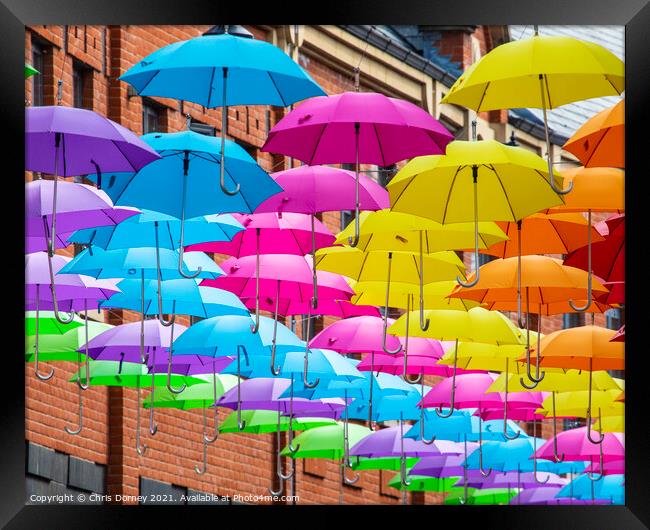 Hanging Umbrellas in Durham, UK Framed Print by Chris Dorney
