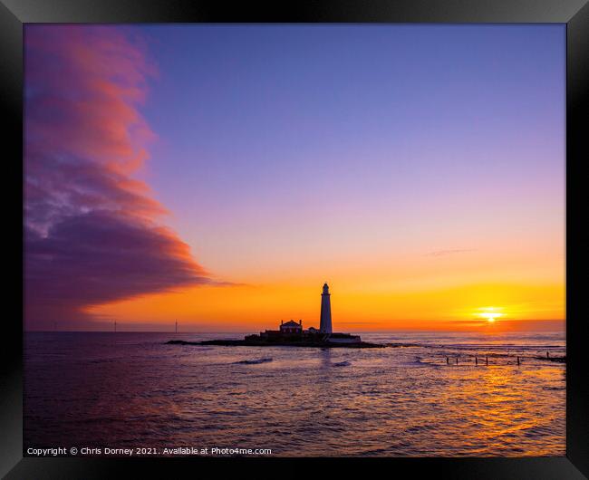 Sunrise at St. Marys Lighthouse in Northumberland, UK Framed Print by Chris Dorney