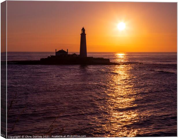 Sunrise at St. Marys Lighthouse in Northumberland, UK Canvas Print by Chris Dorney