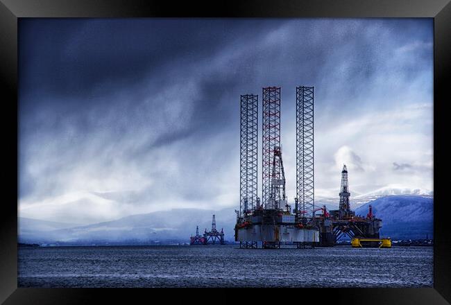 Oil rigs sheltering from a late winter storm, Cromarty Firth Framed Print by Jacqi Elmslie