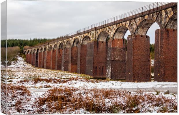 A snow covered landscape at the old railway viaduct at the Big Water of Fleet Canvas Print by SnapT Photography