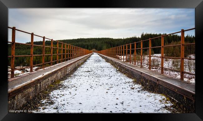 A snow covered old railway viaduct at the Big Water of Fleet and Galloway Forest Framed Print by SnapT Photography