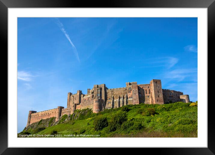 Bamburgh Castle in Northumberland, UK Framed Mounted Print by Chris Dorney