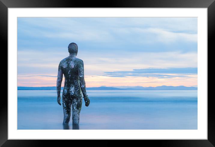 Iron Man surrounded in water at twilight Framed Mounted Print by Jason Wells