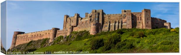 Bamburgh Castle in Northumberland, UK Canvas Print by Chris Dorney