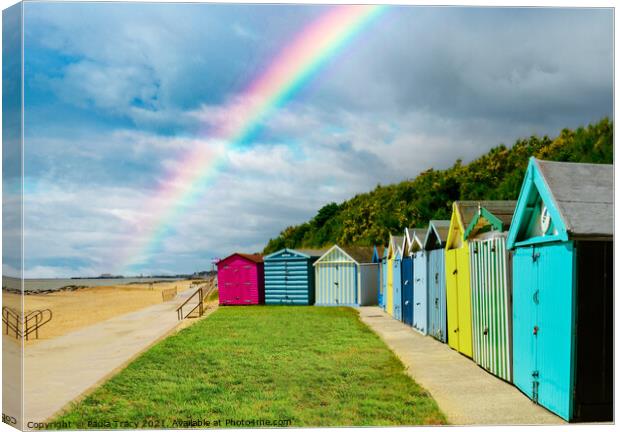 Beach huts and rainbow at Holland-on-Sea Canvas Print by Paula Tracy