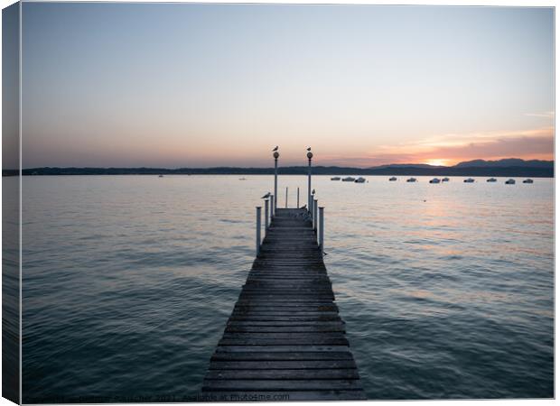 Lake Garda Jetty at Sunset Canvas Print by Dietmar Rauscher