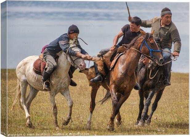 Closeup shot of men riding horses in a field, Son Kul, Kyrgyzsta Canvas Print by Frank Bach