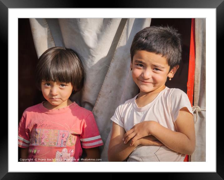 Closeup shot of two smiling girls in Kyrgyzstan Framed Mounted Print by Frank Bach