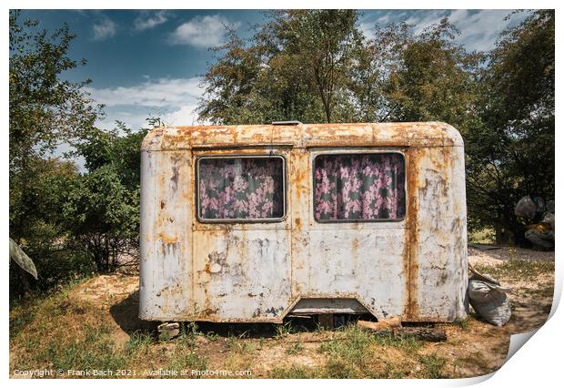 A closeup shot of a rusty wagon as a shelter Print by Frank Bach