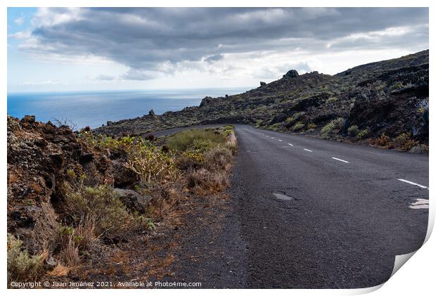 Empty road in a volcanic landscape in the Island of La Palma Print by Juan Jimenez