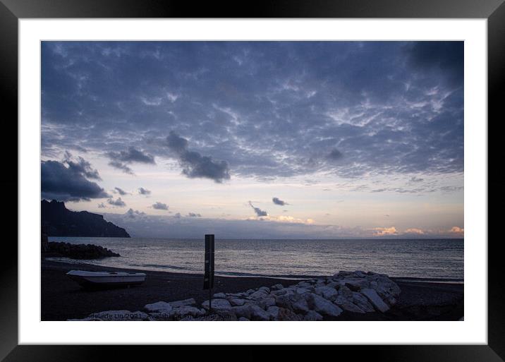 Beach with cloudy sky and a small boat  Framed Mounted Print by Adelaide Lin