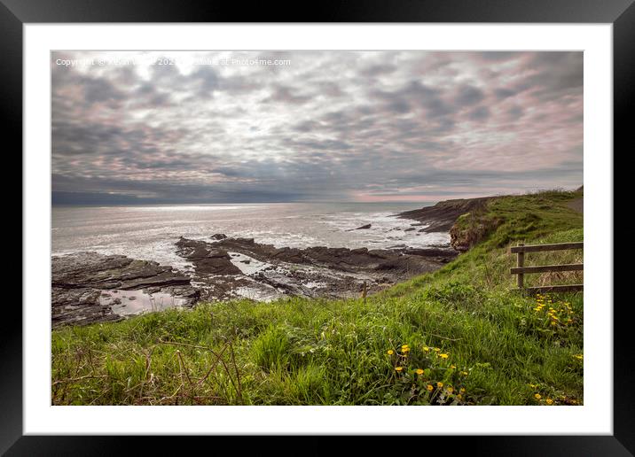Howick dramatic coastline Framed Mounted Print by Kevin White