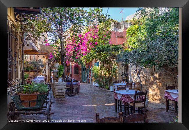 Outdoor restaurant in Chania Framed Print by Kevin Hellon