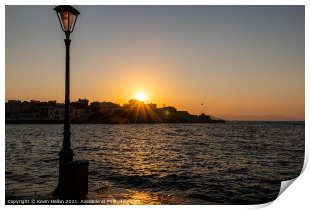 Sun setting over the Venetian Harbour, Chania Print by Kevin Hellon