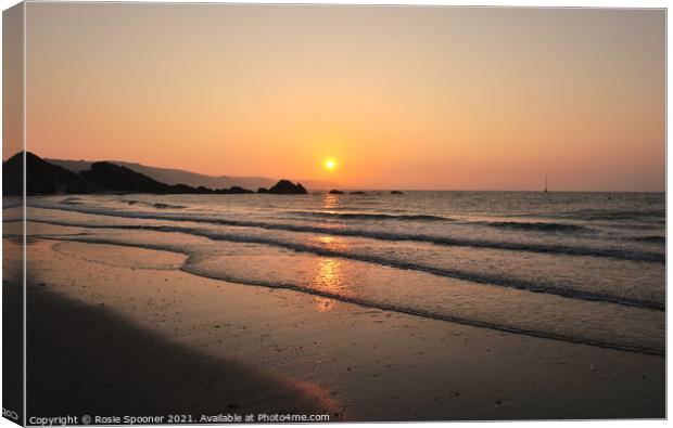 Sunrise on Looe Beach at Low tide Canvas Print by Rosie Spooner