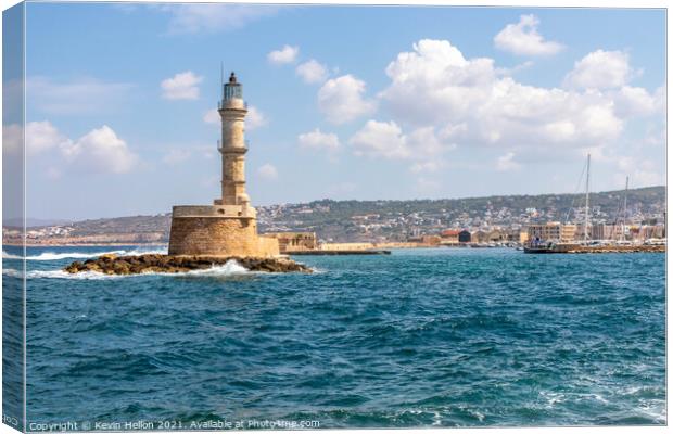 Lighthouse at the entrance to the old Venetian Har Canvas Print by Kevin Hellon