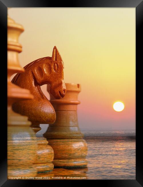 Sunset Chess Battle Framed Print by Dudley Wood