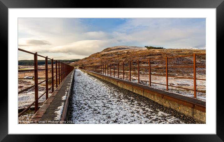 A snow covered old railway viaduct at the Big Water of Fleet at the Cairnsmore Framed Mounted Print by SnapT Photography