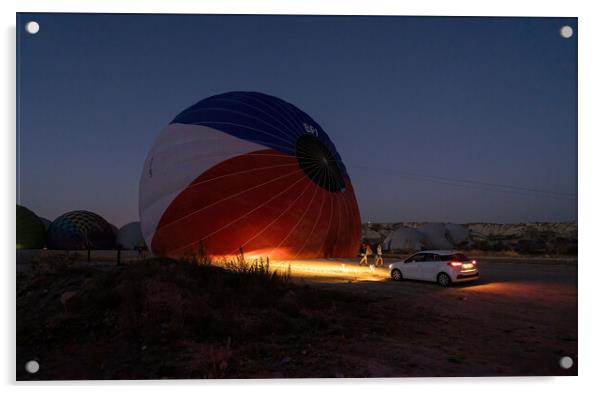 A car parked in front of a hot air balloon with headlights on during night, preparation of a flight in Goreme national park in Cappadocia, Turkey Acrylic by Arpan Bhatia