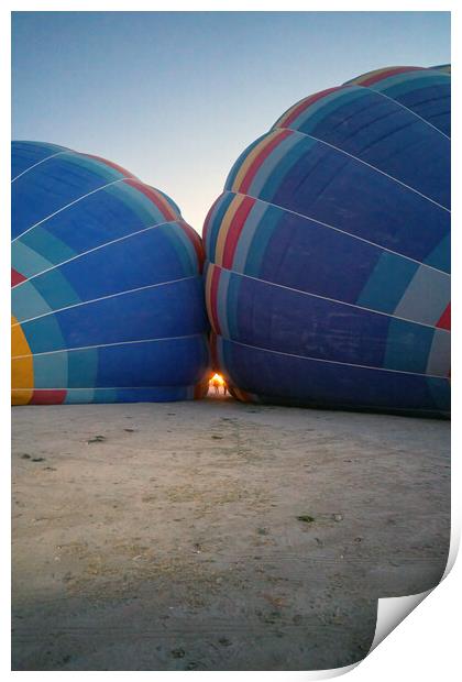 Coloful air hot air balloons facing each other being filled with helium gas during night, preparation of a flight in Goreme national park in Cappadocia, Turkey Print by Arpan Bhatia