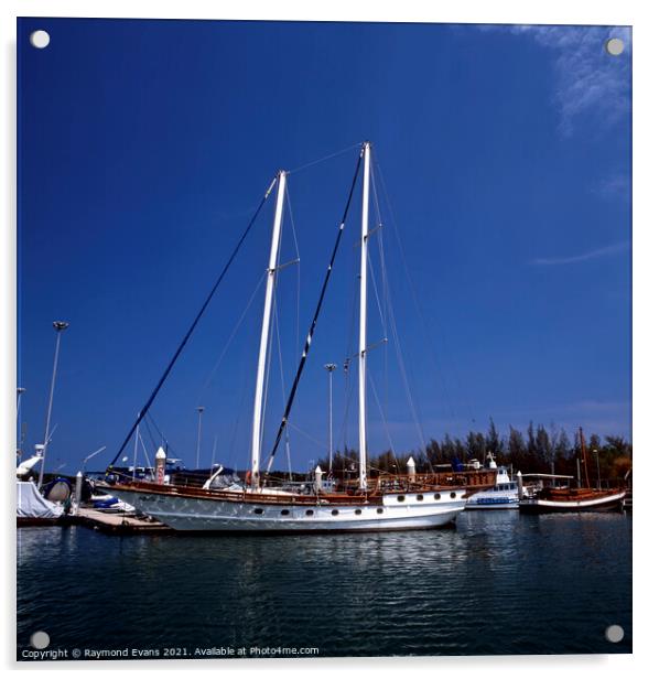 Saing boat at anchor Acrylic by Raymond Evans
