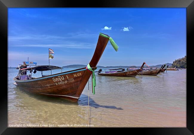 Thailand longtail boats Krabi beach Framed Print by Raymond Evans