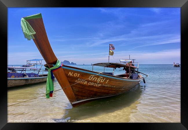 Thailand longtail boat Krabi beach Framed Print by Raymond Evans
